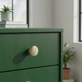 50 mm round wooden cabinet knob installed on cabinet door