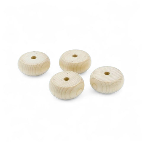 Backside of 30 mm rounded wooden toy wheels with holes