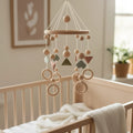Turned wooden rings used in hanging baby crib mobile
