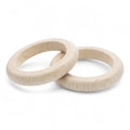 Close-up of 60 mm outside rounded flat wooden rings showing wood grain