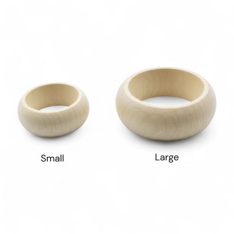 Turned birch napkin rings showing small and large sizes